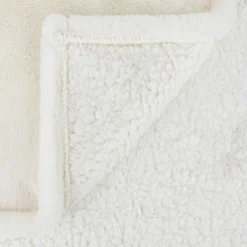 Plaid à manches fourrure